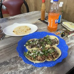 Sabor Casero - 2 lengua tacos, 2 tripa tacos, and 1 pupusa revuelta