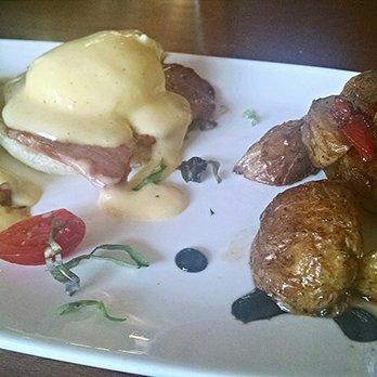 Angry Moon Cafe - Eggs Benedict with Potatoes. - Wine Bars Near Me - Palm Beach Gardens, Florida