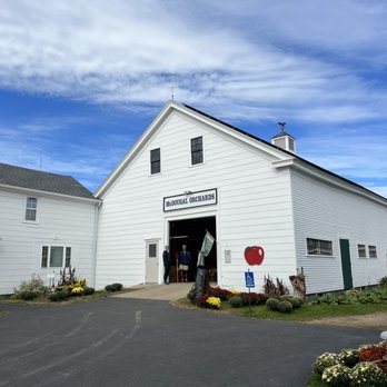 McDougal Orchards - a white building with a sign that says mcdougal orchards - Donuts Near Me - Springvale, Maine