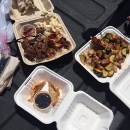Steak w chicken, chicken w veggies n brown rice, potstickers w chili sauce Steak w chicken, chicken w veggies n brown rice, potstickers w chili sauce