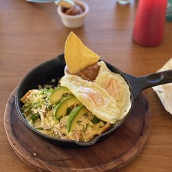 La Playa - Chilaquiles with half poblano cream and half chipotle cream sauce. THE BEST Chilaquiles I've ever had!!