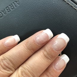 A clean and natural French manicure  look .