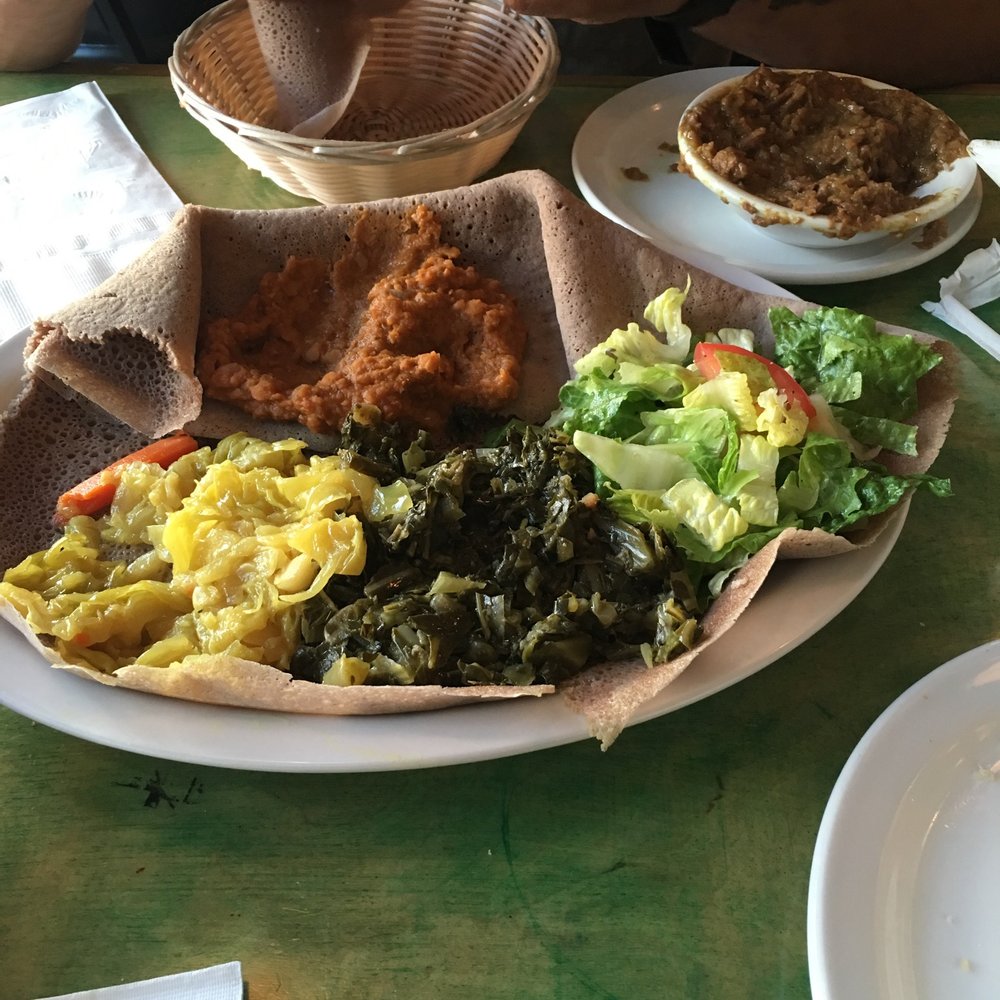 Cafe Desta - Misr (spicy red lentil), Gomen (collard greens) and Tikil-Gomen (cabbage) - Coffee & Tea Near Me - Tucson, Arizona