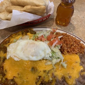 El Charritos - The cheese enchilada plate with green chile, and added an egg! SO DANG GOOD! And of course sopapillas! - New Mexican Cuisine Near Me - Albuquerque, New Mexico