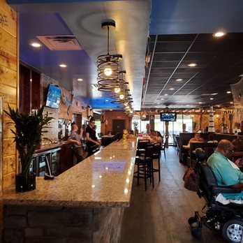 Juicy Seafood-Smyrna - a man in a wheelchair in a restaurant - Seafood Near Me - Smyrna, Tennessee Juicy Seafood-Smyrna - a man in a wheelchair in a restaurant - Seafood Near Me - Smyrna, Tennessee