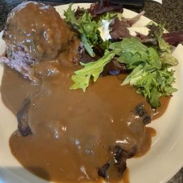 Hamburger steak with multi-grain rice and tossed sald Hamburger steak with multi-grain rice and tossed sald