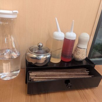 Kajiken - At every table was a full water carafe, chili paste, vinegar, oil, dry onion flakes and a drawer of chopsticks! - Ramen Near Me - Dublin, California Kajiken - At every table was a full water carafe, chili paste, vinegar, oil, dry onion flakes and a drawer of chopsticks! - Ramen Near Me - Dublin, California