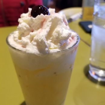 Snooze, an A.M. Eatery - Orange snoozius! Screwdriver with whip cream - Breakfast & Brunch Near Me - Phoenix, Arizona