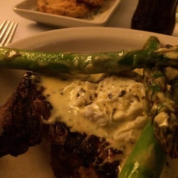 Harry & Izzy's - Boneless Ribeye medium Oscar style with a side of fried green tomatoes. - Steakhouses Near Me - Indianapolis, Indiana Harry & Izzy's - Boneless Ribeye medium Oscar style with a side of fried green tomatoes. - Steakhouses Near Me - Indianapolis, Indiana