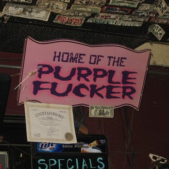 Orio's Roadhouse - a sign that says home of the purple pucker - Dive Bars Near Me - Durango, Colorado
