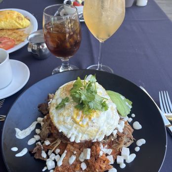 Derricks - Chilaquiles with carnitas and white sangria - Salad Near Me - Yorba Linda, California Derricks - Chilaquiles with carnitas and white sangria - Salad Near Me - Yorba Linda, California