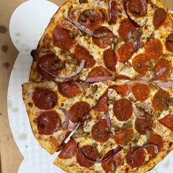 Pasqually's Pizza & Wings - Pepperoni, onion and Sausage pizza.