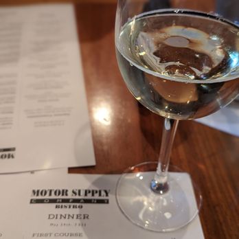 Motor Supply Co Bistro - a glass of wine - New American Near Me - Columbia, South Carolina