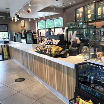 Starbucks - a coffee shop with a long counter - Coffee & Tea Near Me - Watertown, Massachusetts Starbucks - a coffee shop with a long counter - Coffee & Tea Near Me - Watertown, Massachusetts