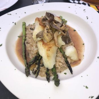 Chef Fredy's Table - Chilean sea bass over mushroom risotto very good! - New American Near Me - Morristown, New Jersey