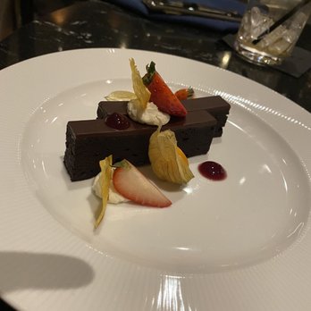 Atlas Steak + Fish - Spiced chocolate ganache torte - Steakhouses Near Me - Burnaby, British Columbia Atlas Steak + Fish - Spiced chocolate ganache torte - Steakhouses Near Me - Burnaby, British Columbia