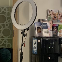 The light for her podcast at the reception table The light for her podcast at the reception table