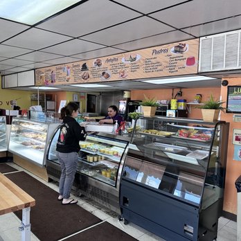 The Mill Bakery - a woman standing in front of the counter - Bakeries Near Me - Santa Ana, California The Mill Bakery - a woman standing in front of the counter - Bakeries Near Me - Santa Ana, California