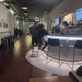 42N at The Flats - Bar area and looking towards door from high top tables - Brewpubs Near Me - Buffalo, New York 42N at The Flats - Bar area and looking towards door from high top tables - Brewpubs Near Me - Buffalo, New York
