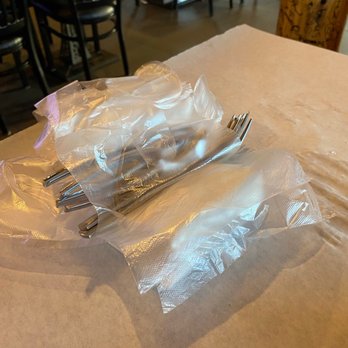 Storming Crab - Gloves, bibs, forks and shell cracker - Seafood Near Me - Fort Wayne, Indiana