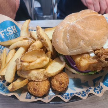 The Fish Joint - Crispy beer battered cod sandwhich with fresh potato wedges - Seafood Near Me - Coconut Creek, Florida The Fish Joint - Crispy beer battered cod sandwhich with fresh potato wedges - Seafood Near Me - Coconut Creek, Florida
