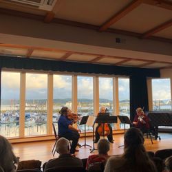 Lincoln County Historical Society - The Pacific Maritime Heritage Center has a world class venue inside: the Doerfler Family Theater. Shown: Newport Symphony String Quartet.
