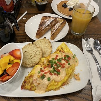Another Broken Egg Cafe - Mardi Gras omelette, fresh fruit, side of French toast - Breakfast & Brunch Near Me - Winter Park, Florida Another Broken Egg Cafe - Mardi Gras omelette, fresh fruit, side of French toast - Breakfast & Brunch Near Me - Winter Park, Florida