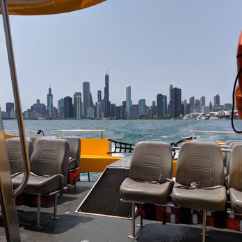 Seadog Cruises - Rear of vessel with skyline backdrop - Boat Charters Near Me - Chicago, Illinois Seadog Cruises - Rear of vessel with skyline backdrop - Boat Charters Near Me - Chicago, Illinois
