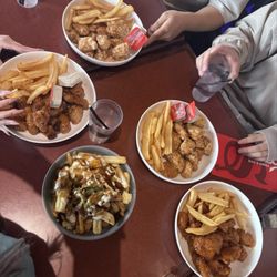 St. Louis Bar & Grill - .monday ayce wings and st louis poutine