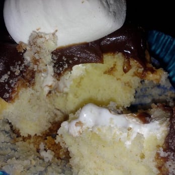 Fluffy Thoughts Cakes - Inside of vanilla cupcake w/ marshmallow cream filling - Bakeries Near Me - McLean, Virginia