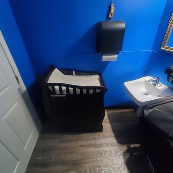 Ollie Cat Cafe - Bathroom - clean and even has a changing table! - American Near Me - Luray, Virginia Ollie Cat Cafe - Bathroom - clean and even has a changing table! - American Near Me - Luray, Virginia
