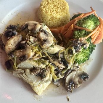 Cafe Seville - Halibut Ole (lemon wine sauce w/ artichokes, mushrooms, and leeks) - DELISH - Spanish Near Me - Fort Lauderdale, Florida Cafe Seville - Halibut Ole (lemon wine sauce w/ artichokes, mushrooms, and leeks) - DELISH - Spanish Near Me - Fort Lauderdale, Florida