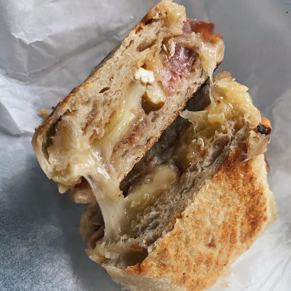 Tatte Bakery & Cafe | Third St - Panini with prosciutto, brie + fontina cheese, pear and fig jam - Cafes Near Me - Cambridge, Massachusetts Tatte Bakery & Cafe | Third St - Panini with prosciutto, brie + fontina cheese, pear and fig jam - Cafes Near Me - Cambridge, Massachusetts