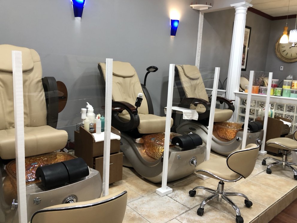 Nail Salon Signature Spa Logo