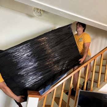 Hercules Moving Heroes - Our movers Miles and Jacob lifting a huge dresser! - Movers Near Me Hercules Moving Heroes - Our movers Miles and Jacob lifting a huge dresser! - Movers Near Me