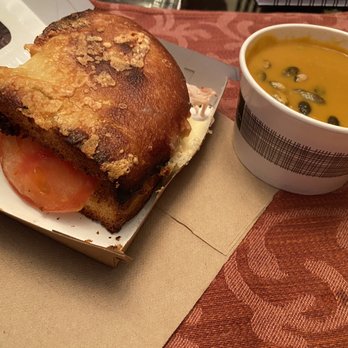 Panera Bread - You pick 2 with autumn squash soup and 1/2 Frontega Chicken On Focaccia - Sandwiches Near Me - Clemmons, North Carolina