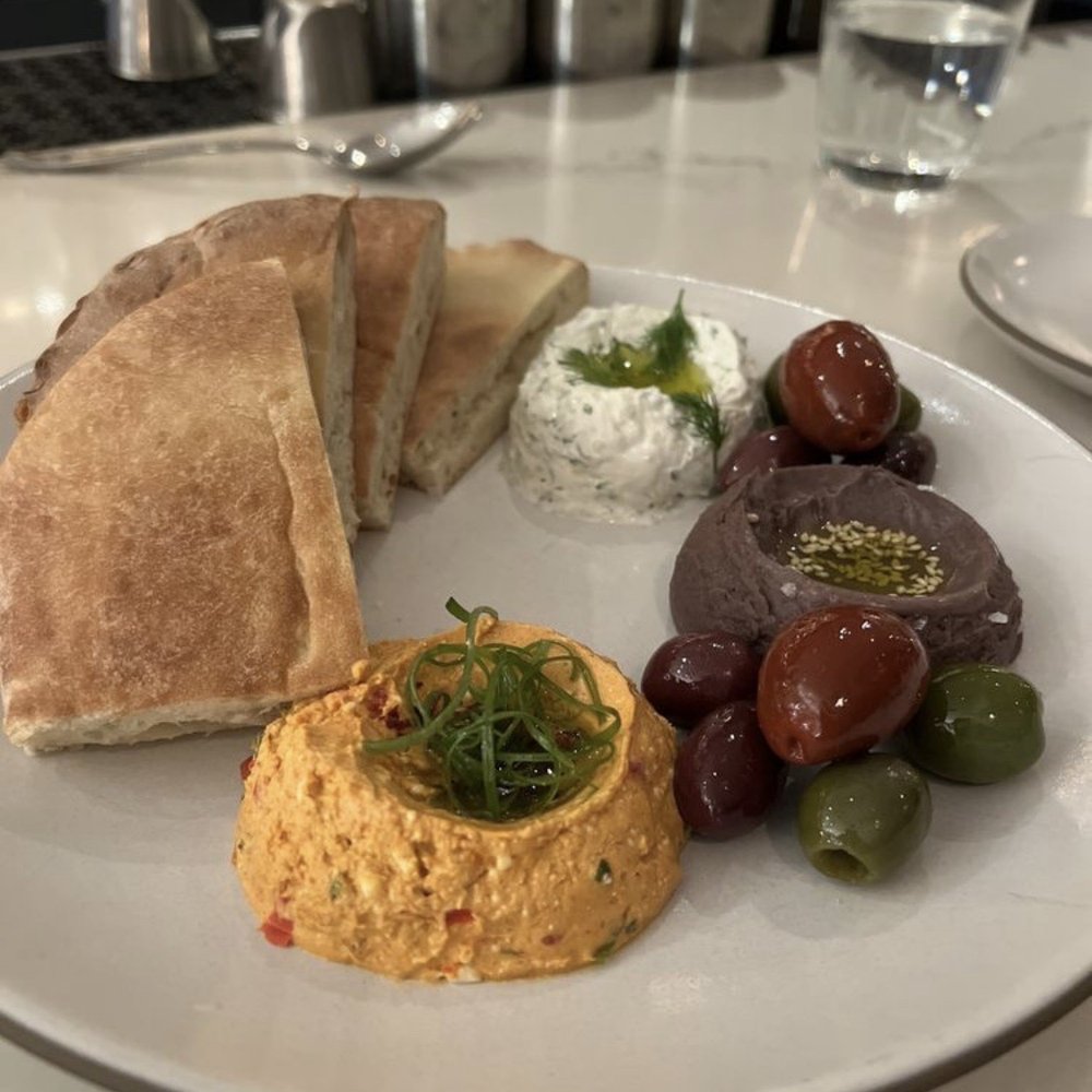 Chickadee - Hummus and seasoned olives - New American Near Me - Boston, Massachusetts Chickadee - Hummus and seasoned olives - New American Near Me - Boston, Massachusetts