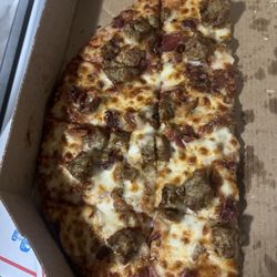 Domino's Pizza - Thin crust Italian and bacon pizza! Already ate half of it. Delicious and hot!