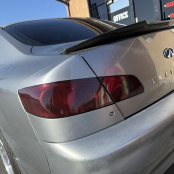 JL Window Tint - Tail light half wrapped in silver color to match car paint and also tail light tint - Car Window Tinting Near Me - Tracy, California JL Window Tint - Tail light half wrapped in silver color to match car paint and also tail light tint - Car Window Tinting Near Me - Tracy, California