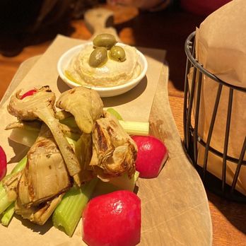 Seasons 52 - Artichoke appetizer with hummus and pita bread. It was good. - New American Near Me - Lone Tree, Colorado