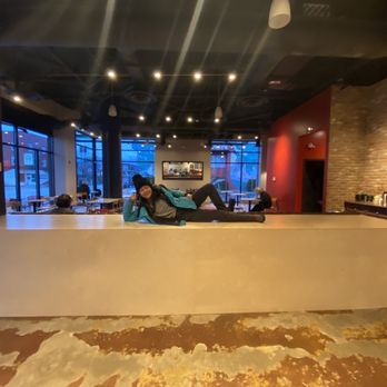 Artigiano - Main St - Me on the table at the cafe - Coffee & Tea Near Me - Vancouver, British Columbia