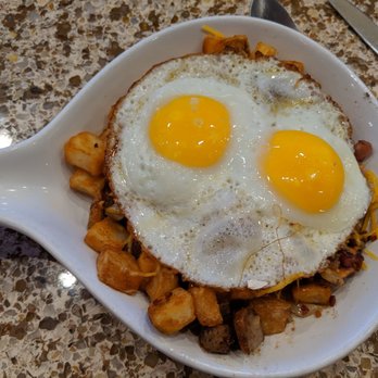 Hanover & Hardy's Public House - two fried eggs on top of hash browns - Bars Near Me - Bolingbrook, Illinois