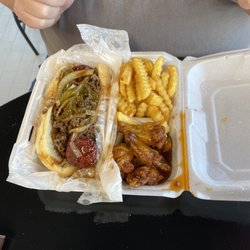 Catch A Taste - Polish dawg with seasoned ground beef and peppers, wings with sweet heat sauce and seasoned fries.