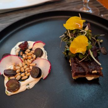 All Spice - Truffled goat cheese and onion tart (vegetarian) Caramelized onions and pears, goat cheese yogurt, grapes, hot oil, radishes, pine nuts, mic - Indian Near Me - San Mateo, California