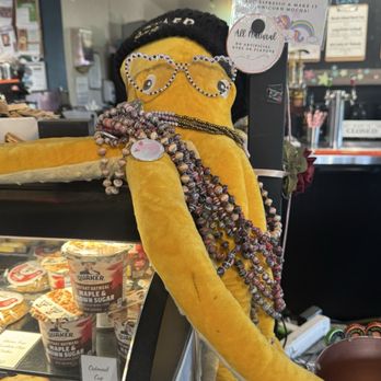 Junkyard Social Club - Cute stuffed octopus sitting on the counter at Junkyard Social. - Playgrounds Near Me - Boulder, Colorado Junkyard Social Club - Cute stuffed octopus sitting on the counter at Junkyard Social. - Playgrounds Near Me - Boulder, Colorado