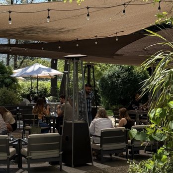 Sequoia Grove Winery - Well shaded tasting area at Sequoia Grove is perfect for cooling down on a warm day - Wine Tasting Room Near Me - Rutherford, California