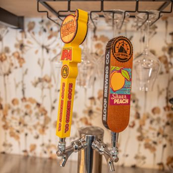 Truffle Honey - two beer taps on a bar - Pizza Near Me - Mayville, New York Truffle Honey - two beer taps on a bar - Pizza Near Me - Mayville, New York