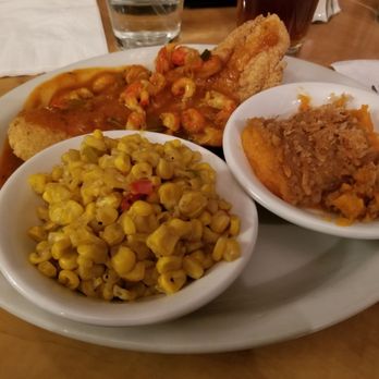 The French Quarter - Smothered catfish with crawfish etouffee, sweet potato casserole and corn. Loved it! - Cajun/Creole Near Me - Rochester, New York The French Quarter - Smothered catfish with crawfish etouffee, sweet potato casserole and corn. Loved it! - Cajun/Creole Near Me - Rochester, New York