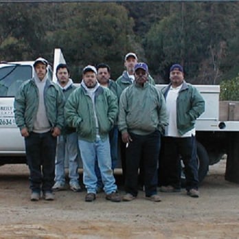 Tom Reily Landscape - a group of men standing in front of a truck - Landscaping Near Me - Santa Cruz, California Tom Reily Landscape - a group of men standing in front of a truck - Landscaping Near Me - Santa Cruz, California