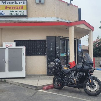 Valentine Market - a motorcycle parked in front of a store - Grocery Near Me - Fresno, California Valentine Market - a motorcycle parked in front of a store - Grocery Near Me - Fresno, California